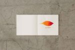 15347006-simeiomatario-tetragono-notebook-MD-Cottong-Square-Midori-MD-Paper-Art&Colour-Open-on-Concrete